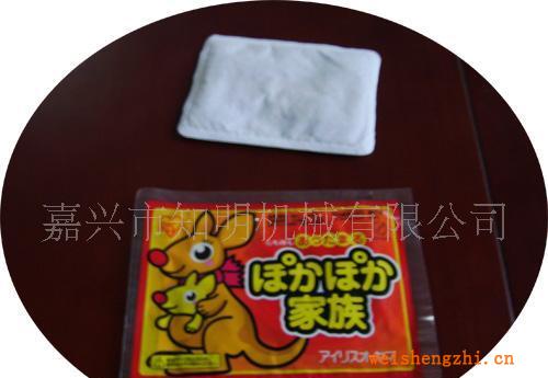 暖寶寶包裝機(jī)-正宗四邊封包裝機(jī)!